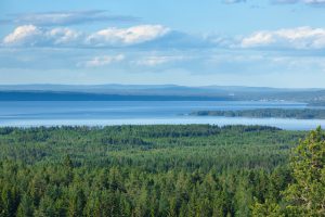 View over forests and Lake Siljan in Dalarna, Sweden.
